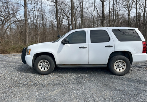 2012 Chevy Tahoe, White, Miles 145,660. Runs and drives.